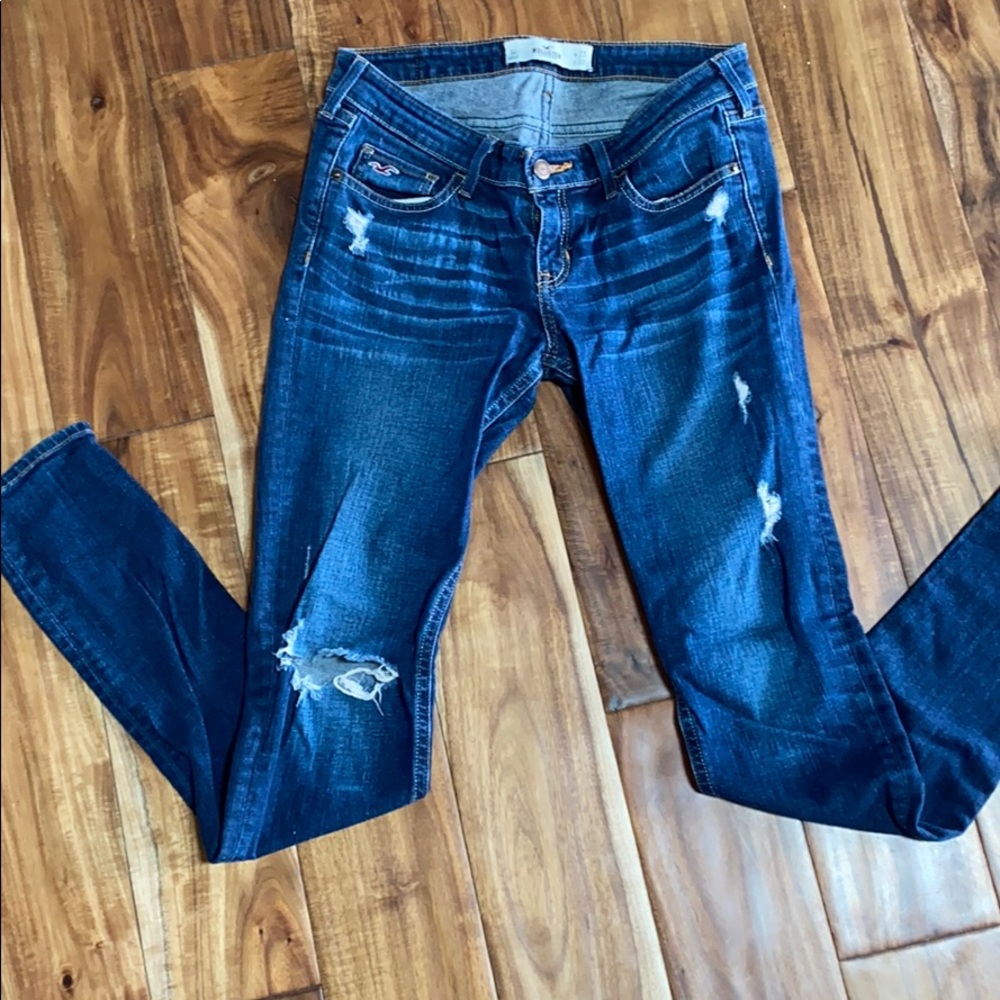 Distressed dark jeans